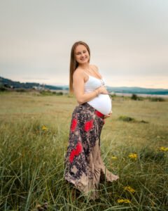 Pregnant woman in the fields.