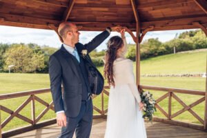 Groom twirling the bride.