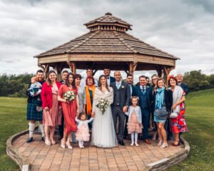 Group of wedding guests with family members.
