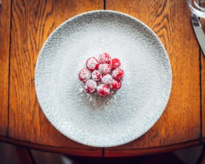 Top side view of a raspberry tart.