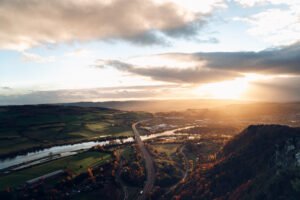 Cross road somewhere Scotland during sunset.